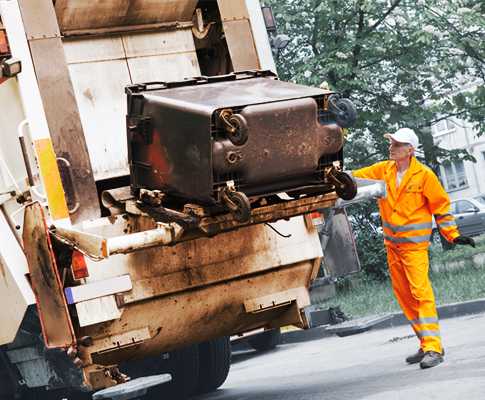 waste truck picking up bin