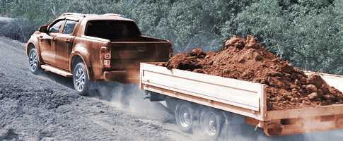 Pick-up hauling dirt